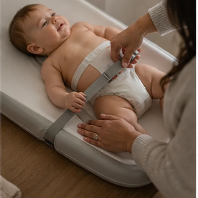 Skip Hop Wipe-Clean Changing Pad in use